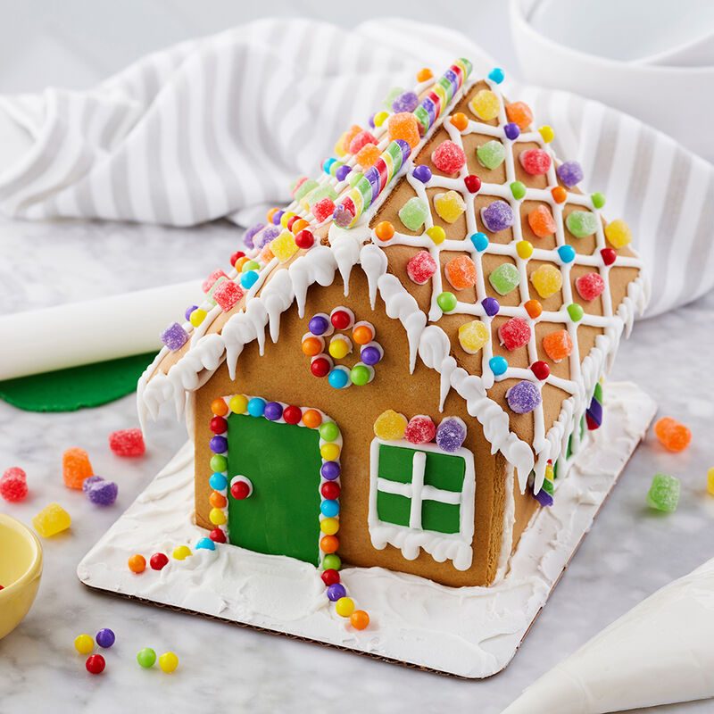 gingerbread house, colorful gum drops, white icing